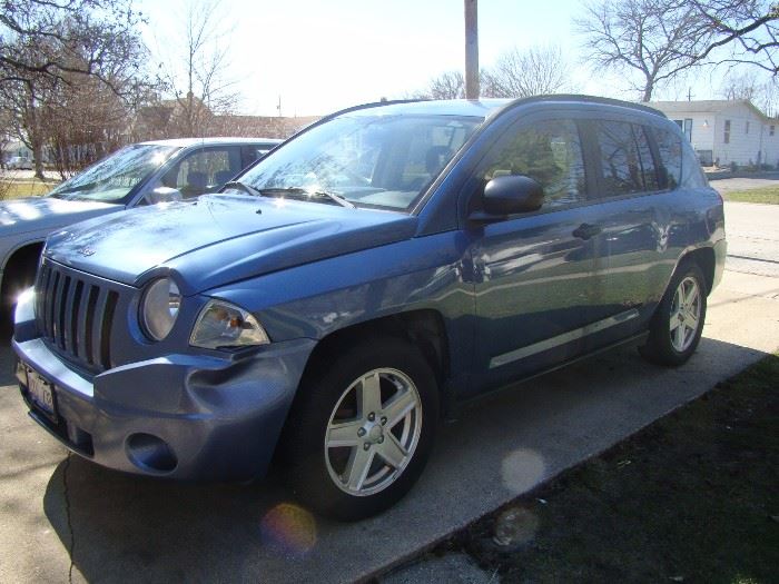 2007 Jeep Compass Sport with title.  $4200