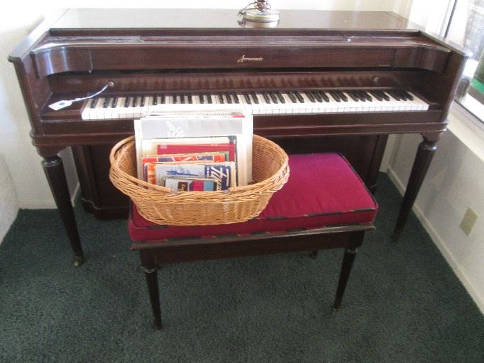 Acrosonic Traditional style dark wood piano with stool.