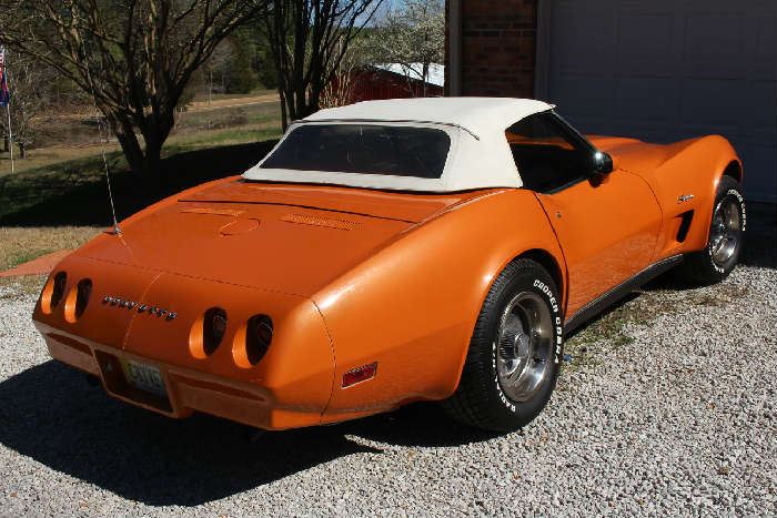 4 - 1974 Corvette Stingray convertible, soft and hard white top, orange body, tan interior in running and drivable condition, 70,000 miles