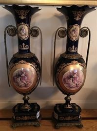 pair of French palace sized hand painted porcelain vases, 20th c., each: 49in(H) x 14in(L) x 13.5in(W)
