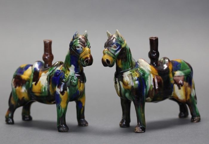 pair of Chinese sancai glazed porcelain horses, Qing dynasty, each: 6in(L) x 5.25in(H)  