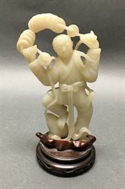 Chinese white jade carving of a boy, 19th c., overall: 6.25in(H) x 3.25in(L)   