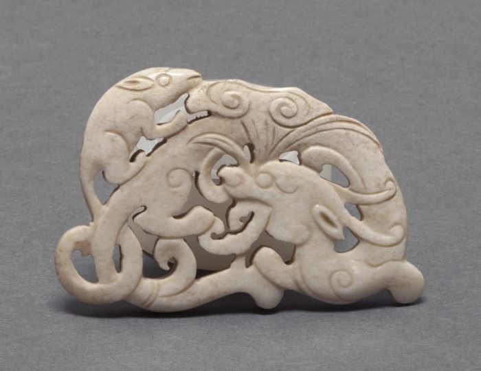 Chinese 'chicken bone' jade carving, Qing dynasty, 2.74in(L) x 1.81in(W) 