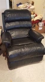 Black recliner   small mark on seat    $75  Buy ahead