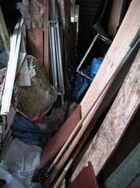 Lots of misc wood pieces in outdoor shed