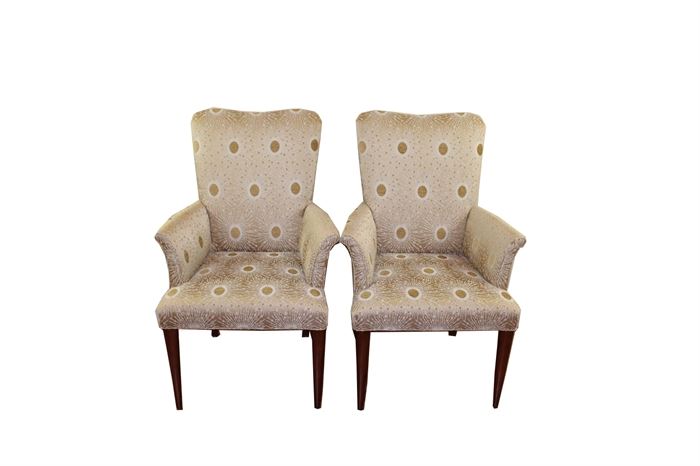Pair of Classics by Swaim Captain’s Chairs: A pair of Classics by Swaim designer captain’s chairs. These chairs feature a gently curved top to the fitted backrests, slightly flared armrests, fitted seats, and round tapered front legs. They are upholstered in a multi-textured abstract woven fabric in hues of light tan to caramel.

Opened in 1945, Swaim Furniture has built a reputation for handcrafting high-quality custom designs using unique fabrics and dramatic materials. They are located in High Point, North Carolina.

• Companion chairs can be found in listing 17CIN182-004