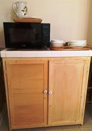 Tiled Counter Storage Cabinet, Haier Microwave, Pitcher, Dishes, Citation Savannah Grove Collection Pitcher