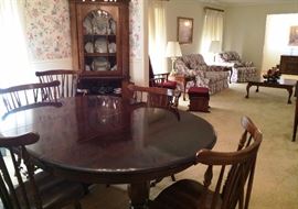 Corner Cabinet, Dining room Table, Love Seat & Matching Chair (Sofa not in picture). Glider Rocker w/Glider Ottoman. End Tables, Table Lamps, Framed Art, Coffee Table & More