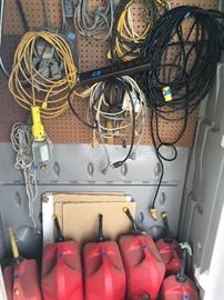 Several Gas Cans & Extension Cords