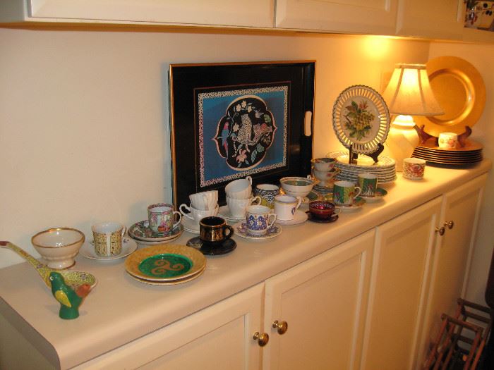 Tea cup collection. Decorative plates. Set of gold chargers 