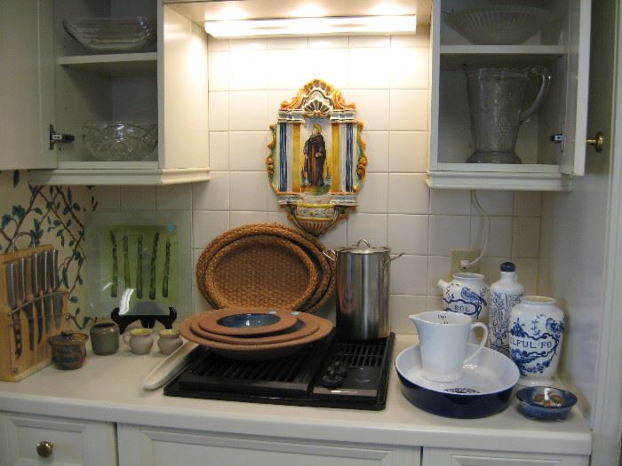 Lots of kitchen items to chose from platters, depression glass , knife sets, kitchen tools. 