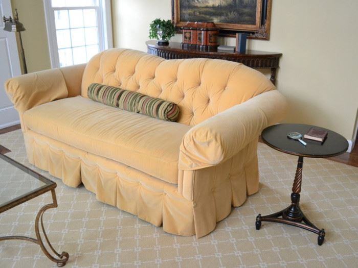 Custom velvet sofa and side table