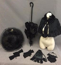 Collection of (9) Antique Ladies Mourning Apparel: (1) hat w/ feathers & woven flowers; (1) parasol w/ hand-carved handle & lacy design, working but damaged; (2) pairs of fingerless gloves; (2) pouches / purses; & (1) ruffled shawl w/ damask design
