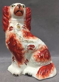 Antique Staffordshire porcelain dog figurine of a spaniel, 7" wide by 9.5" tall
