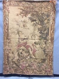 Antique Neoclassical French wool tapestry, depicting women w/ cherubs in garden, surrounded by ornate floral designs, approx 6'4" x 4'5"
