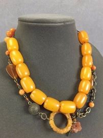 (2) Vintage Amber Necklaces to include large Butterscotch bead necklace, length 21.5"; (1) Bead & charm necklace, length 20"

