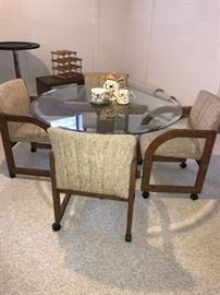 ROUND GLASS-TOP TABLE WITH 4 CHAIRS - 48” IN DIAMETER AND 28.5”TALL