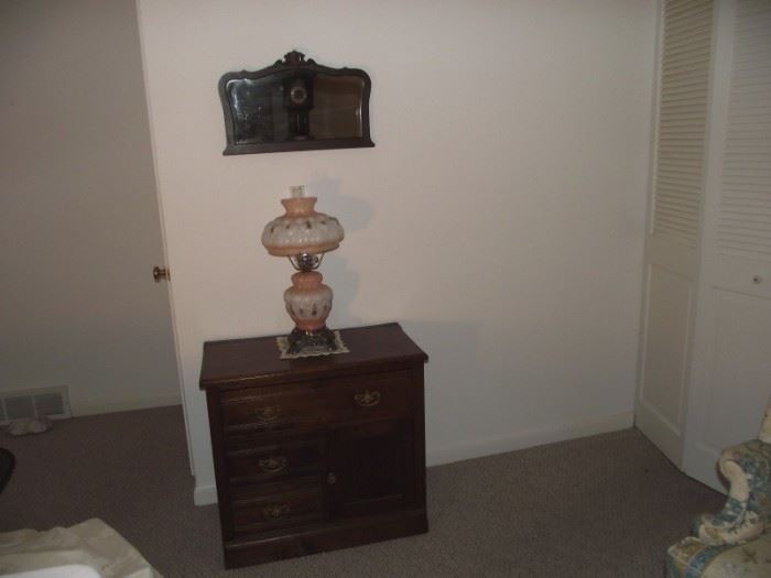 Oak wash stand cabinet, GWTW lamp and carved wood frame mirror