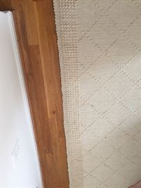 one of two wool, off white rugs 3x5 & 5x7