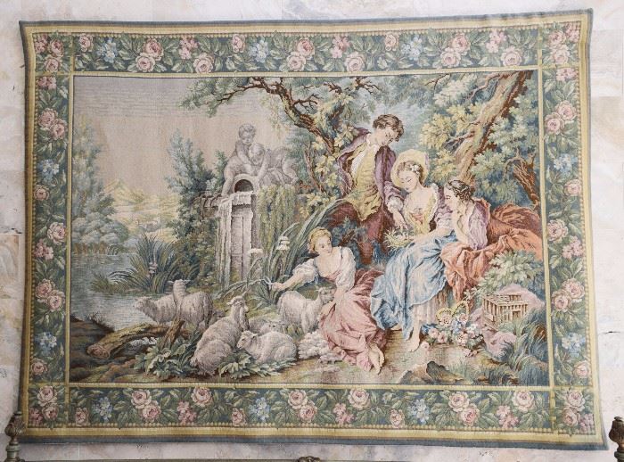 19th/20th  c.,  France  ;;  possibly  by  Goblys  Taperstry,  or  possibly  made  in  the  Beauvais  region  of  France.  Woven  tapestry    in  the  style  of  the  18  century  depicting  a  group  of  yong  revelers  in  a  pastoral  landscape  with  animals  and  surrounded  by  a  floral  border,  57”h  x  76.5”w.  