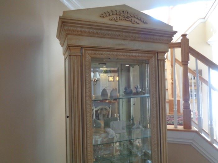 Top portion of curio cabinet with glass shelves & light