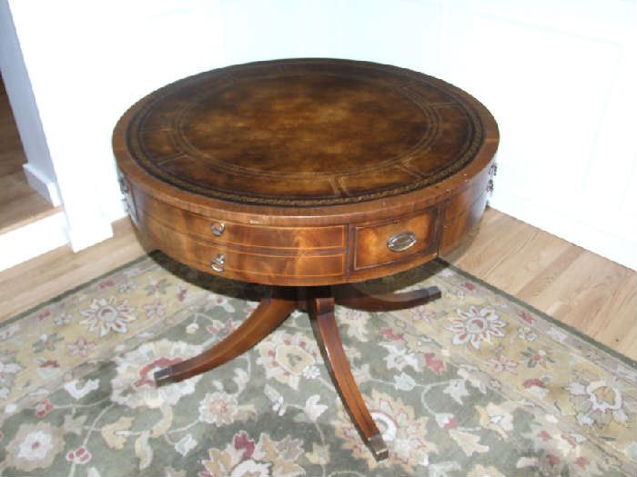 WEIMAN ANTIQUE DRUM TABLE, WITH DRAWERS AND EMBOSSED LEATHER TOP.