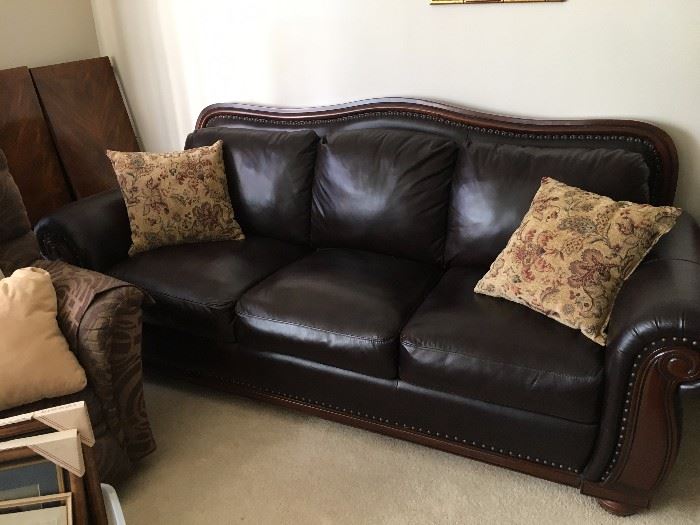 leather sofa with wood trim