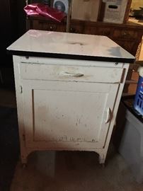 Vintage cabinet with enamel top