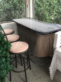 Outdoor bar and barstools