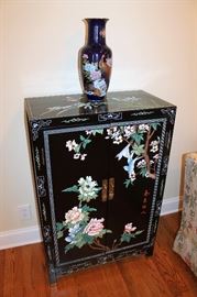 Asian lacquered cabinet and cobalt peacock vase