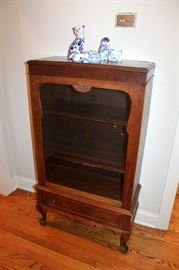Small antique glass-door cabinet