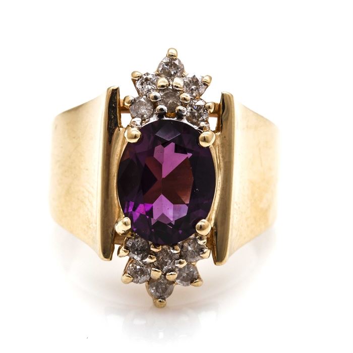 14K Yellow Gold Amethyst and Diamond Ring: A 14K yellow gold amethyst and diamond ring.