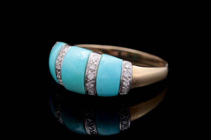 14K Gold, Turquoise, and Diamond Ring: A 14K gold, turquoise, and diamond ring. The ring features three segments of turquoise separated by lines of white gold accented with prong-set diamonds.
