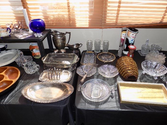 Silver plate serving pieces. Cut glass. Decorative items