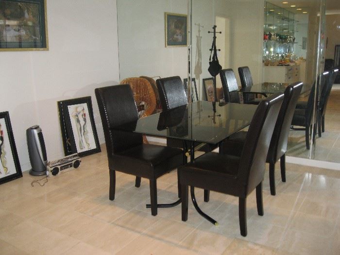 Dining Table, Glass top with great black leather chairs. 