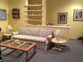 Couch, Regency end tables w/marble tops, Glass top coffee table, Pair Touch lamps.Wall shelf, knick knacks.