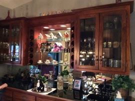 Wine cabinet utensils, cocktail serving goblets glasss, pitchers,