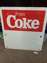 Coke logo painted on porcelain