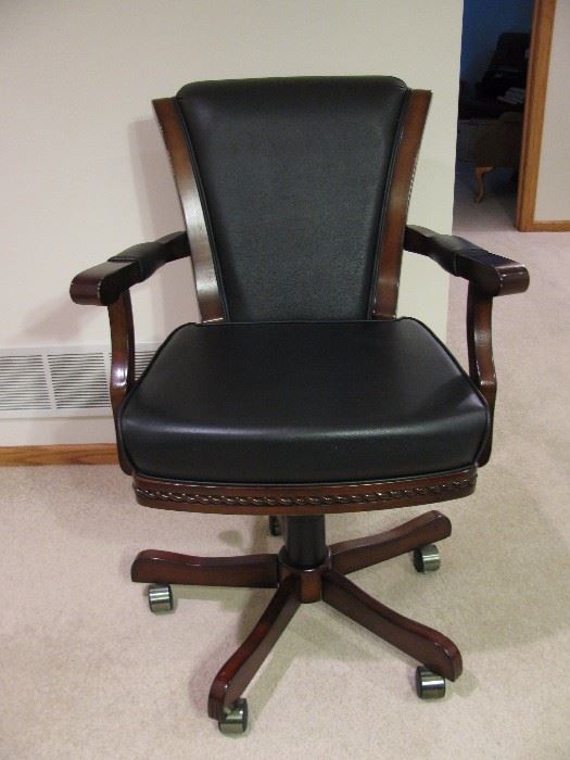 One of six chairs that were bought with the game table.  The chair has multiple adjusts available.