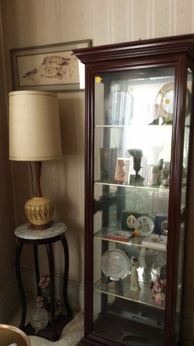 Mid Century lamp and display cabinet that contains White House collectible Christmas Ornaments and other smalls