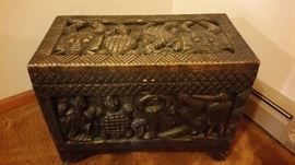 Handcarved wooden trunk