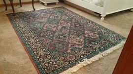 5x7 fringed area rug - predominant colors mauve and teal