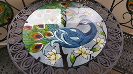 Beautiful outdoor wrought iron table with glass top 