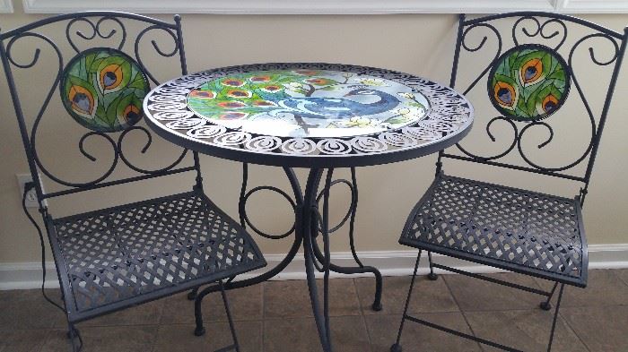 Glass top peacock table and 2 chairs