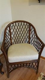 Vintage rattan chair with upholstered seat