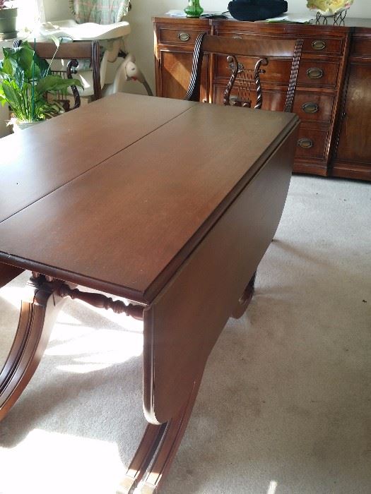 Drop leaf table with chairs