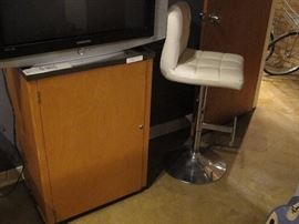Heavy duty locking cabinet with steel top.  Bar Stool with foot rest