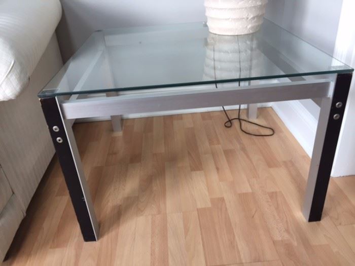 Glass side table - Modern metal design.