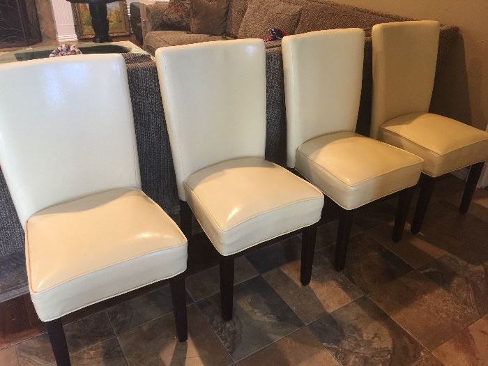 4 leather Parsons chairs