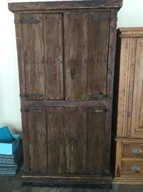 Very rustic large armoire, will hold flat screen TV